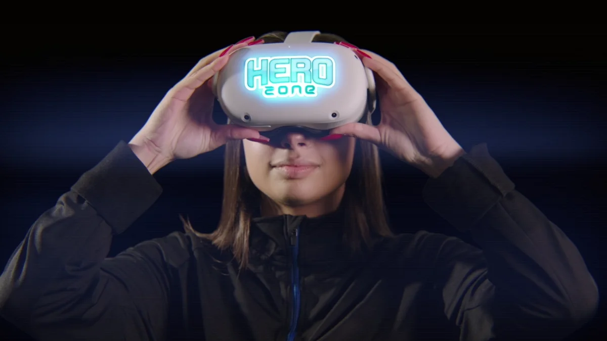 A player putting on a Hero Zone VR headset